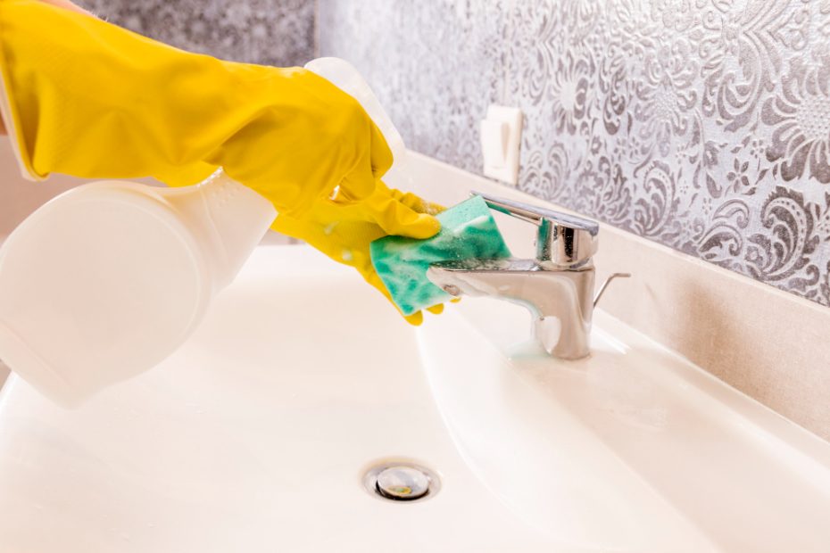 Restroom Cleaning Supplies: "A selection of essential restroom cleaning supplies, including disinfectants, microfiber cloths, and gloves, displayed on a countertop.